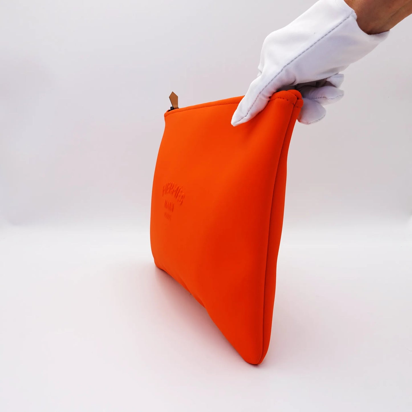 Hermès Bain Zip Pouch in orange coated canvas / neoprene