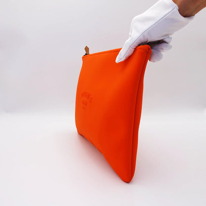 Hermès Bain Zip Pouch in orange coated canvas / neoprene